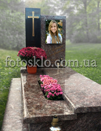 Marble monument with photo glass on fasteners